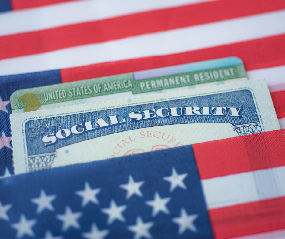Social Security and Green Card nestled under the United States Flag.